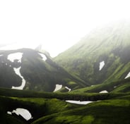 green mountain under white sky during daytime