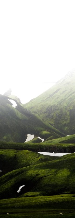 green mountain under white sky during daytime