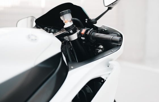 white and black sports bike