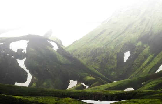 green mountain under white sky during daytime