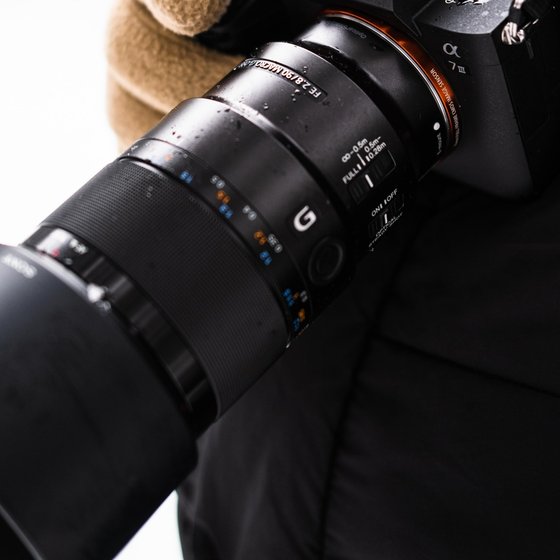 Photographer holding camera